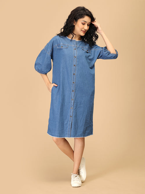 Blue chambray utility dress for women featuring button-down front and relaxed silhouette