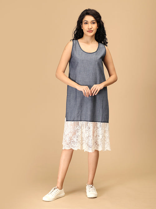 Front view of sleeveless chambray midi dress with white floral lace panel