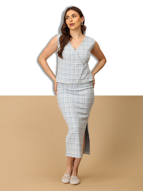 Woman wearing a checkered dress on a beige background